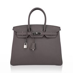 Guaranteed authentic Hermes Birkin 35 bag featured in Etain - the most perfect medium gray and is utterly neutral. Fresh with palladium hardware. Hermes leather in rich Clemence is textured and highly scratch resistant.This beautiful gray Birkin bag is a classic addition to any Hermes handbag collection.Comes with sleepers, clochette, raincoat, lock, keys and signature Hermes box.NEW or NEVER WORNMightychic offers a seamless experience for Hermes Birkin online shopping and your Hermes purchase. final sale BAG MEASURES:LENGTH 35 cm / 14"TALL 25 cm / 10"DEEP 18 cm / 7" HANDLES:TALL 5" CONDITION: NEW or NEVER WORN Chic Epsom Leather Bag With Lock, Epsom Leather Bags With Lock For Everyday Use, Luxury Bags With Silver-tone Hardware In Epsom Leather, Epsom Leather Bag With Silver-tone Hardware For Daily Use, Top Handle Epsom Leather Bag With Lock, Top Handle Bags In Epsom Leather With Lock, Epsom Leather Top Handle Bags With Lock, Timeless Epsom Leather Bag With Branded Hardware, Everyday Luxury Epsom Leather Textured Bags