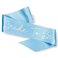 a blue ribbon with the words bride to be written on it