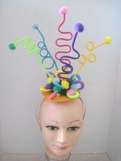 * This is a simple festive headpiece that would be perfect for that fun seeking gal who loves to party or for a birthday celebration or a kid's playday.   *  This design features Five (5) different colors curled acrylic tubes each with it's own pom pom.  The base of the design is covered in the various colors of pom poms and acrylic oblong forms all for that party feel. *   It's well balanced and comfortable and made to sit directly on top of the head and will fit just about any head size.  It i Spongebob Musical, Junk Kouture, Festival Headpiece, Floral Headdress, Clown Horror, Unicorn Fashion, Headpiece Diy, Diy Pom Pom, Spring Tea