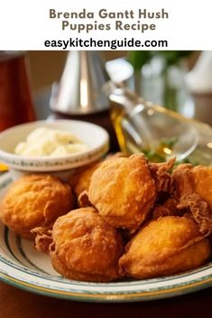 some fried food is on a plate with dipping sauce