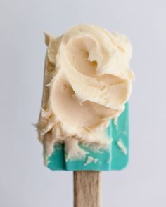 a popsicle with cream frosting on it