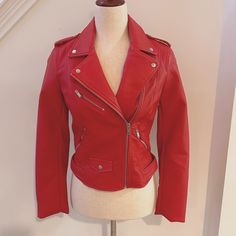 Zara Trf Outerwear, New With Tags, Vegan Leather Size: S Gorgeous Tomato Red Motorcycle Jacket With Silver Zipper Detailing. Small Mark On The Shoulder And One Small One On The Back (Please See Pictures). Fun Jacket That Looks Amazing Dressed Up Or Down. Approx. Measurements (Jacket Lying Flat): - Shoulder To Cuff: 23 Inches - Shoulder To Bottom (Length): 21 Inches - Underarm To Underarm: 16.5 Inches Zara Red Outerwear For Fall, Trendy Red Leather Jacket For Work, Red Biker Jacket For Work In Spring, Casual Red Biker Jacket For Work, Red Leather Jacket With Zipper For Spring, Trendy Red Leather Jacket For Spring, Casual Red Leather Jacket For Work, Trendy Red Biker Jacket For Spring, Red Motorcycle Jacket