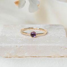 Details: - Available in 14k gold fill or sterling silver - 1.3mm Textured Round Band - 4mm Amethyst (They are genuine gems so the color will vary) Since every piece is handmade, you may experience a slight color difference in places where the metal has been soldered making every piece truly unique. F O L L O W * U S Like it or love it? We want to hear from you! Follow us on Instagram @ajajewelry Ring Minimal, Minimal Ring, Simple Ring, Ring Simple, Textured Ring, Ring Gemstone, Rings Simple, Inner Strength, Amethyst Stone