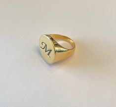 signet ring - Pinky ring - Personalized Ring - Initial Ring - Best quality 18k Gold Plate Engraving your initial or your name. Seal diameter: 20 mm The product will arrive to you packed in gift box and padded envelope to maintain the product Thank you for your interest. Please check out our other items and be sure to add us to your favorites! https://www.etsy.com/shop/Limajewelry We look forward to the opportunity of serving you. Symbolic Signet Ring With Engraving Option, Engraved Couple Rings For Formal Occasions, Symbolic Hallmarked Initial Ring, Symbolic Round Engraved Personalized Ring, Symbolic Personalized Engraved Round Ring, Symbolic Personalized Engraved Ring, Personalized Symbolic Signet Ring, Symbolic Oval Signet Ring Personalized, Personalized Oval Signet Ring Symbolic Style