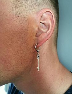 One silver clip-on earring, clip-on arrow , arrow dangle, one men dangle, long arrowhead dangle, masculine dangle, masculine arrowhead, gift Earring with clip-on hook length 1.8 ( 47 mm ) Charm length 29 mm Circle size 14 mm NOTE: Delivery time to Europe is 7 to 14 working days. Delivery time to US or the rest of the world - 14-30 working days. Masculine Earrings, Crochet Clip, Earring Gifts, Clip On Earrings, Favorite Jewelry, Jewelry Earrings Dangle, Dangle Drop Earrings, Dangle Earrings, Etsy Accessories