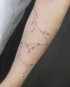 a person with a tattoo on their arm