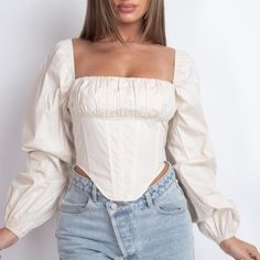 This Cream Colored Corset Has Puffed Sleeves That Can Be Worn On Or Off The Shoulder. Corset Is Boned In Front And Back For Structure And Support With A Zipper Back. Woven Gathered Bust Is Not See Thru, So No Bra Needed, But Optional. This Top Has Moderate Stretch And Runs True To Size. Front V-Cut Taper For An Extra Slimming Effect. Model Is 5'4' And Wearing Size Small. Summer Long Sleeve Corset, Puff Sleeve Corset Top, Puff Long Sleeve Top, Puff Long Sleeves, Oversize Knit, Puffy Sleeves, Polka Dot Blouse, Puff Sleeve Top, Top Fabric