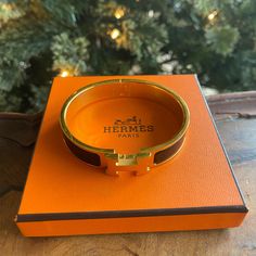 New Hermes Palladium Bracelet In Black With Gold Accents. Worn Once Hermes Leather Bracelet, Hermes Bangle, Hermes Bracelet, Silk Bracelet, Hermes Jewelry, Bracelets Gold, Enamel Bracelet, Black Bracelets, Stackable Bracelets