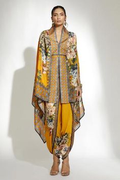 Mustard asymmetric cape with floral printed motifs and split sleeves.
Components:1
Pattern:Printed
Type of Work:Floral
Neckline:V Neck
Sleeve Length:Split Sleeves
Fabric:Silk
Color:Yellow
Other Details:
Floral print
Note: Pant, belt and inner worn by the model is not for sale
Occasion:Work,Resort - Aza Fashions Biopunk Aesthetic, Solarpunk Art, Asymmetric Cape, Rajdeep Ranawat, Cape For Women, Lehenga Saree Design, Saree Wearing Styles, Morning Dress, Kaftan Designs