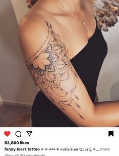 a woman with a tattoo on her arm