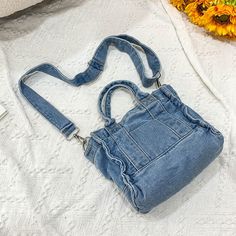 Brand Name: YogodlnsHandbags Type: Shoulder BagsTypes of bags: Shoulder & Crossbody BagsMain Material: DenimLining Material: PolyesterShape: SquarePlace Of Origin: GUANG DONG ProvincePlace Of Origin: GUANG DONG ProvinceOrigin: CN(Origin)CN: GuangdongHardness: SoftPattern Type: SolidInterior: No PocketDecoration: NONEExterior: Open PocketOccasion: VersatileClosure Type: zipperGender: WOMENStyle: FashionNumber of Handles/Straps: SingleWomen Bag: Fashion Women BagsShoulder Bag: Blue Denim Shoulder Upcycled Handbag, Bling Purses, Denim Crossbody, Denim Handbags, Vintage Crossbody Bag, Fabric Handbags, Denim Shoulder Bags, Pearl Bag, Women Crossbody Bag