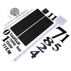 an assortment of black and white stickers on a white surface with the numbers 1, 2, 3, 4