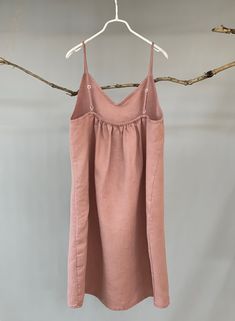 "Nothing welcomes the hot weather more than linen. This simple linen slip dress is a must have and can be more playful if layered. -100% linen construction -V neck -Slightly A-line shaped -Adjustable spaghetti straps -Above the knee -Slip on overhead -Listing colors: Blush, Natural, and White Please provide your shoulder width, full bust measurement ( measured around the fullest part) and your height along with your order in the note to seller box. Don't see your size? Please message us for cust Sundress Mini, Linen Cami, Linen Camisole, Dress Above The Knee, Linen Slip Dress, Mini Summer Dress, Simple Linen, Navy Shirt Dress, Linen Sundress