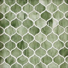 a green and white tile with wavy lines