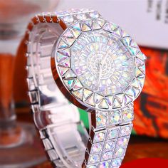 Product Information: Display type: pointer Movement type: quartz Crown type: Flat top taper crown Mirror material: sapphire crystal glass mirror Buckle style: butterfly double buckle Buckle material: stainless steel Band material: alloy Dial size: diameter 43MM thickness 10MM Packing list: Watch *1 Silver Diamond Watch With Rhinestones And Crystal, Party Diamond Watch With Rhinestones, Diamond Watch With Rhinestones For Party, Silver Diamond Watch With Crystal For Parties, Silver Crystal Diamond Watch For Parties, Silver Cubic Zirconia Diamond Watch For Party, Silver Diamond Watch With Cubic Zirconia For Parties, Silver Crystal Watch With Rhinestones, Silver Diamond Watch With Bling For Party