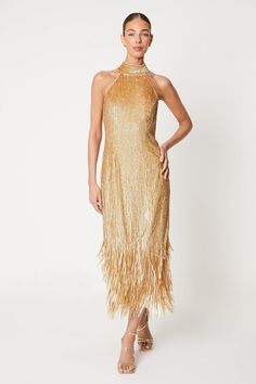 You name the occasion, we have the perfect dress. From maxi to mini and everything in between, find your dream dress to feel confident in. Choose classic shift dresses and flowing floor-length pieces for a timeless style, plus discover on-trend bardot and wrap dresses to wear on repeat. Style: Fringe Sequin Halter Midi Dress.  Ideal for: Occasion.  Design: Sequin.  Model wears size UK 10 and is 5' 9" tall. Wedding Guess Dress, Girls Occasion Dresses, Sequin Halter, Black Tie Dress, Shift Dresses, Wrap Dresses, Halter Midi Dress, Guess Dress, Dresses To Wear