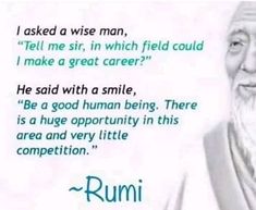 an old man with white hair and beard wearing a long white robe, standing in front of a sign that says rumi