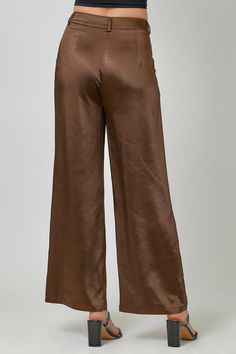 Mara Pants Introducing the Mara Pants, a luxurious addition to your wardrobe. These satin pants in rich chocolate are crafted for comfort and style. Elevate any outfit with their smooth, sophisticated finish and indulge in the ultimate indulgence of luxury fashion. Perfect for any occasion, the Mara Pants are a statement piece that exudes elegance and grace.