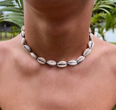 Step out in cool seaside tones in our Lido Necklace! Featuring a unique colored cord, this style is sure to impress! Grey Lacquered Cowrie Shells Wax Cord approx 16" with adjustable 7" knot - adjustable and waterproof! Matching anklet and bracelet!  Mix and match with your favorite HALT pieces or wear alone for boho beach vibes. The perfect gift for him or her. Our jewelry is handmade in the Sunshine State with local materials and shipped with an effort to use environmentally friendly packaging, making it the perfect choice for those who shop with a green mindset. Vacation Accessories, Cowrie Shells, Perfect Gift For Him, Cowrie Shell, Sunshine State, Boho Look, Beach Vibes, Boho Beach, Beach Vibe