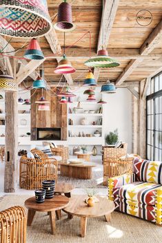 a living room filled with lots of colorful furniture