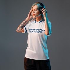 Show off your love for Eilish with this unique "Hit Me Hard and Soft" jersey! Perfect for concerts, casual outings, or lounging at home, this stylish and comfortable jersey is a must-have for any fan. 🎵 High-quality material ensuring comfort and durability. 🎤 Unisex design suitable for all Billie Eilish fans. 👕 Versatile style perfect for concerts, daily wear, or gifting. 🖤 Classic black and white color scheme that matches any outfit. 🌟 Unique " Hit Me Hard and Soft" graphic showcasing your fandom with flair. Add this trendy jersey to your collection and stand out wherever you go! White Fan Apparel Jersey For Streetwear, Billie Eilish Tshirt, Billie Eilish Merch Collection, Billie Eilish Hit Me Hard And Soft Merch, Billie Eilish Graphic Tee, Concert Fits, Black And White Colour, White Aesthetic, Unisex Design