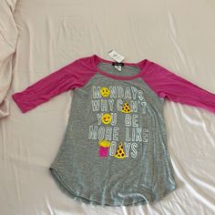 Girls Miss Popular Raglan T-Shirt In Grey And Pink. “Mondays Why Can’t You Be More Like Fridays” Glitter Writing. 3/4 Sleeve In Rayon/ Spandex Blend Popular Shirts, Raglan Tshirt, Popular Shirt, Girl Top, Tshirt Colors, Kids Shirts, Shirts Tops, Long Sleeve Tees, Tops & Tees