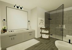 a bathroom with a large mirror over the bathtub