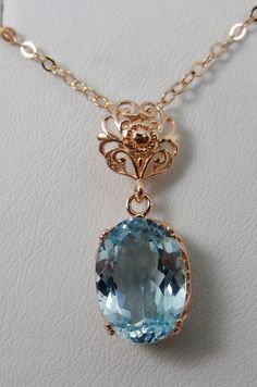 blue topaz pendant, with a natural blue topaz oval stone set in floral rose gold filigree, 4 prongs hold the gem in place Edwardian Necklace, Ethereal Jewelry, Gold Collar Necklace, Topaz Birthstone, Blue Stone Necklace, Pretty Jewelry Necklaces, Antique Filigree, Princess Jewelry, Edwardian Jewelry