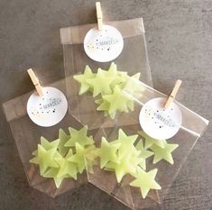 four star shaped candles sitting on top of each other