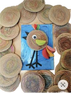 an art project made out of wood slices and paper plates with a turkey on it