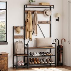 a coat rack filled with shoes and coats next to a wall mounted shoe rack in a living room