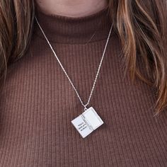 This Advanced Potion-Making textbook is hiding a secret: it opens up to reveal good advice. It’s inscribed with the classic quote “When in doubt, go to the library”, describing Hermione's natural curiosity. This three-dimensional locket charm of the Potions textbook is in shiny silver finish with enamel detailing, and hangs on a shiny silver necklace with an adjustable 17”-20” length. Diamond-cut cable chain length: 20", adjusts to 18" Finishes: Shiny Silver Nickel-free Adorned with Clear crysta Advanced Potion Making, Potion Making, Silver Locket Necklace, Magnetic Jewelry, Wine Glass Charms, Locket Charms, Bangle Bracelets With Charms, Clear Crystals, Charm Bangle