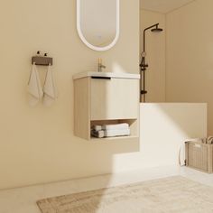 a bathroom with a sink, mirror and towel rack