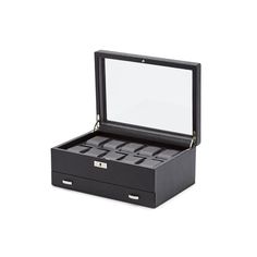 Rule over your collection with authority with a timeless Viceroy 10-piece watch box with storage. A modern classic that exudes an understated elegance, the Viceroy includes a smooth pebble exterior, silver textured silk lining, locking glass cover. COLOR: BLACK SIZE: 5.25" L X 6" W X 5.75" H FEATURES Patented Innovation - Every WOLF winder counts the precise number of rotations. All other winders estimate the number of rotations. Lock-in dynamic cuff: Patented lock-in dynamic cuff ‘locks’ your t Classic Rectangular Case Watches For Formal Occasions, Classic Formal Watches With Rectangular Case, Classic Formal Watch With Rectangular Case, Modern Formal Watch With Rectangular Case, Black Rectangular Case Watch Accessories For Formal, Classic Formal Box Watch Accessories, Modern Rectangular Watch Accessories For Formal Occasions, Modern Rectangular Watch Case For Formal Occasions, Modern Rectangular Case Watch Accessories For Formal Occasions