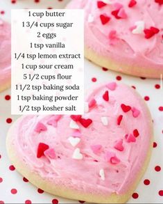 heart shaped sugar cookies with pink frosting and sprinkles