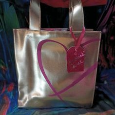 Victoria Secret Picture Of A Model Inside Gold Heart Bag. 9x9in 11in Strap. Brand New. Questions Just Ask Victoria Secret Model, Gold Bag, Victorias Secret Models, Heart Bag, Victoria Secret Bags, Gold Heart, Heart Of Gold, Victoria Secret, Mini Bag