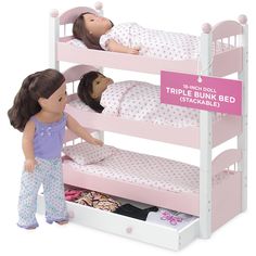 two dolls standing next to each other in a bunk bed with pink bedspreads