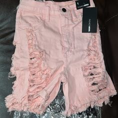 Nwt Fashionnova Distressed Bermuda Shorts In Pink. Unique In Style Shorts Trendy Spring Pants With Built-in Shorts, Trendy Knee-length Shorts, Ripped Cotton Pants For Summer, Trendy Distressed Short Leg Bottoms, Trendy Ripped Pink Bottoms, Ripped Stretch Bottoms For Spring, Spring Stretch Ripped Bottoms, Pink High Waist Ripped Bottoms, High Waist Ripped Pink Bottoms