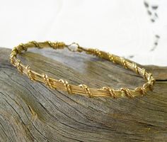 Bold and Charming Gold Wire-Wrapped Bracelet by wiregems on Etsy Gold Hand-wrapped Bracelet, Adjustable Gold Artisan Bracelet, Adjustable Artisan Gold Bracelets, Gold Braided Hand Wrapped Bracelets As Gift, Adjustable Artisan Gold Bracelet, Artisan Adjustable Gold Bracelet, Gold Hand Wrapped Braided Bracelets As Gift, Hand Wrapped Gold Braided Bracelet As Gift, Gold Hand Wrapped Braided Bracelet As Gift