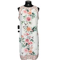 This Gorgeous Wallis Dress Is A Must-Have For Any Fashion-Forward Woman. With Its Stunning Floral Pattern And Flattering Sheath Style, It's Perfect For A Variety Of Occasions Including Weddings, Parties, And Even Casual Wear. The Dress Features A Round Neckline, Sleeveless Design, And Zipper Closure For A Comfortable And Secure Fit. It Is Made From 100% Polyester And Has A Jersey Fabric Type. The Dress Is Knee-Length And Is Available In Size 8, With Hand Wash Care Recommended. Embellished With A Sheath Sleeveless Dress For Summer, Elegant Sleeveless Floral Dress For Daywear, White Fitted Sleeveless Dress With Floral Print, Floral Print Sleeveless Dress For Daywear, Feminine Sheath Sleeveless Summer Dress, White Floral Print Sleeveless Dress For Garden Party, Sleeveless Floral Print Dresses For Daywear, White Sleeveless Floral Sundress, Elegant Sleeveless Floral Dress With Lining