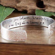 "Take a LOOK at our Website: ANNIEREH.com Inspirational Bracelet, You are braver than you Believe, Stronger than you seem, One Day at a Time, Secret Message Cuff Bracelet Customize our secret message cuff bracelets with your favorite word/s, meaningful phrase, special saying, names of loved ones, grandchildren, dates and even coordinates for the place you met your partner or shared a special moment with someone. This Cuff shown above says You are Braver than you Believe, Stronger than you Seem, Meaningful Engraved Adjustable Bracelet, Adjustable Engraved Meaningful Bracelet, Adjustable Engraved Meaningful Bracelets, Inspirational Engraved Adjustable Name Bracelet, Inspirational Adjustable Engraved Cuff Bracelet, Inspirational Engraved Adjustable Cuff Bracelet, Inspirational Engraved Name Bracelet, Adjustable, Inspirational Stamped Bangle Cuff Bracelet, Adjustable Engraved Inspirational Cuff Bracelet