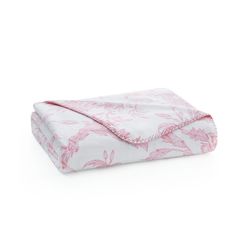 a pink and white floral print sheet set