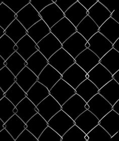 a black and white photo of a chain link fence with diamond shaped links on it