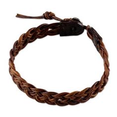 Featuring a handwoven design by local Thai artisans, this wristband bracelet is crafted from leather cord in a brown color. Chaloemphon presents the adjustable bracelet, closing with a silver button that is handcrafted by Karen hill tribe silversmiths. Brown Leather Strap Bracelet, Brown Leather Braided Jewelry, Rustic Adjustable Leather Strap Bracelets, Brown Braided Leather Jewelry, Braided Brown Leather Jewelry, Rustic Brown Jewelry With Adjustable Cord, Casual Brown Jewelry For Festivals, Brown Leather Strap Braided Bracelet Gift, Brown Leather Braided Bracelet