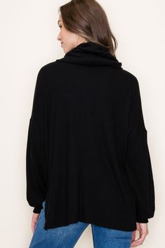 Instantly elevate any look with this sophisticated Nancy Slouchy Cowl Neck Top. Crafted from a luxurious heavy waffle fabric and featuring long sleeved design with relaxed cowl neck and side slits, this timeless piece will add style to any wardrobe. Make an impact with effortless elegance! True to size Chic Oversized Long Sleeve Turtleneck, Black Long Sleeve Top For Loungewear And Fall, Black Long Sleeve Top For Loungewear In Fall, Black Textured Knit Turtleneck With Long Sleeves, Solid Oversized Turtleneck For Layering, Cozy Ribbed Long Sleeve Turtleneck, Solid Color Relaxed Fit Long Sleeve Turtleneck, Relaxed Fit Long Sleeve Solid Turtleneck, Oversized Soft Knit Long Sleeve Turtleneck