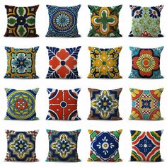 many colorful pillows with different designs on them