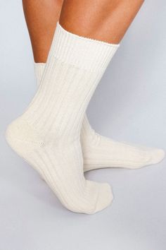 The Mere is our cashmere blend ankles featuring a light ribbing around the sock. Keep it classy in these premium blends. Size+ OSFA, W 6-10 Design+ 168 Needle+ Mid-weight+ Reinforced toe & heel+ Seamless toe+ Sweater knit+ Tall ankle Content + Care+ Premium Cashmere Blend+ Wash Cold/Dry Low+ Imported Soft Classic Solid Color Socks, Classic Soft Solid Color Socks, Cream Ribbed Winter Socks, Cream Ribbed Socks For Winter, Comfortable Cream Socks, Classic White Socks For Fall, White Classic Socks For Fall, White Ribbed Socks, Trouser Socks