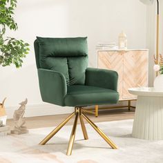 a green chair sitting on top of a white rug next to a potted plant