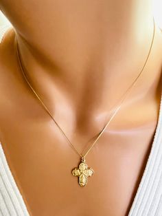 This is a beautiful four way cross charm necklace in gold or silver.  This lovely detailed pendant measures 22x18mm and comes on a shiny cable chain with spring clasp.  The four way cross in made of 925 sterling silver.  The gold version is 16k gold over 925 sterling silver.  The gold charm necklace comes on a 14k gold filled box chain.  The silver charm necklace is all 925 sterling silver.  This charm is made by master silversmiths in New England that have perfected their craft with such imagery and detail, you will be impressed with their work!  Model is wearing a 16 inch length. also available an 18 inch or 20 inch length. Please choose your desired length.  Comes in a cute gift box ready to present! THE FOUR WAY CROSS MEANING... The Sacred Heart - At the top of the cruciform is the sac Yellow Gold Cross Necklace With Charms, Catholic Jewelry Necklace, Miraculous Medal Necklace, Cross Charm Necklace, Cross Necklace Women, Catholic Jewelry, Cute Gift Boxes, Charm Necklace Silver, Gold Charm Necklace