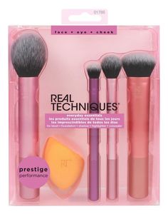 Real Techniques Everyday Essentials Brush Set - Pack of 5 Real Techniques Everyday Essentials Set is a one-and-done set for pro-styled looks. The set comes with the brand's fan favorites: 400 Blush Brush, 300 Deluxe Creasing Brush, 402 Setting Brush, 200 Expert Face Brush and the Miracle Complexion Sponge. It is best used with foundation, concealer, blush, highlighting, and shadow to master face, cheek, and eye makeup. For best results, clean them weekly with our brush cleansing gel. Set Include Real Techniques Setting Brush, Essential Makeup Brushes, Real Techniques Brushes, Makeup Blending, Makeup Blender, Makeup Brush Kit, Blush Highlighter, Beauty Sponge, Real Techniques